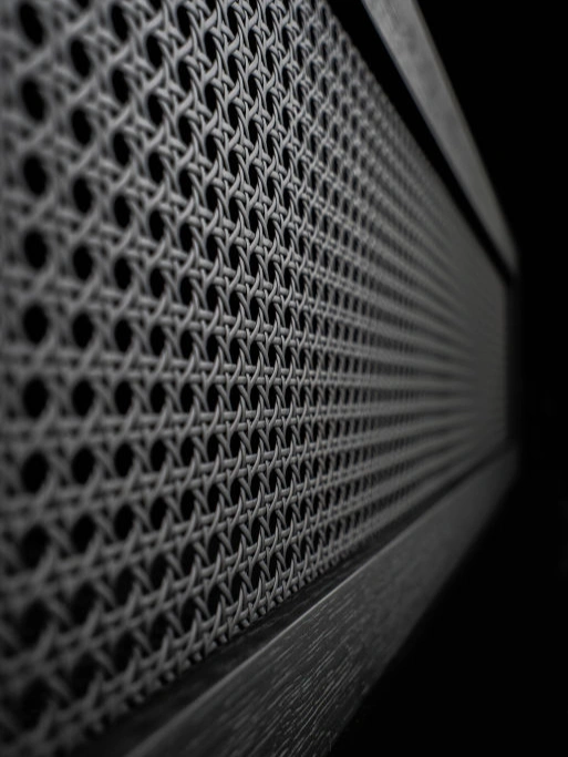 Combine black PVC cane webbing with black industrial wood